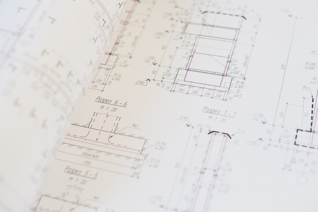 Close-up of a detailed architectural blueprint showcasing design and planning.